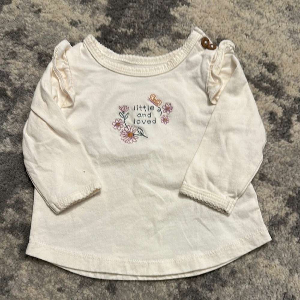 Jeans and a Cream Kids Shirt with Embroidered Design